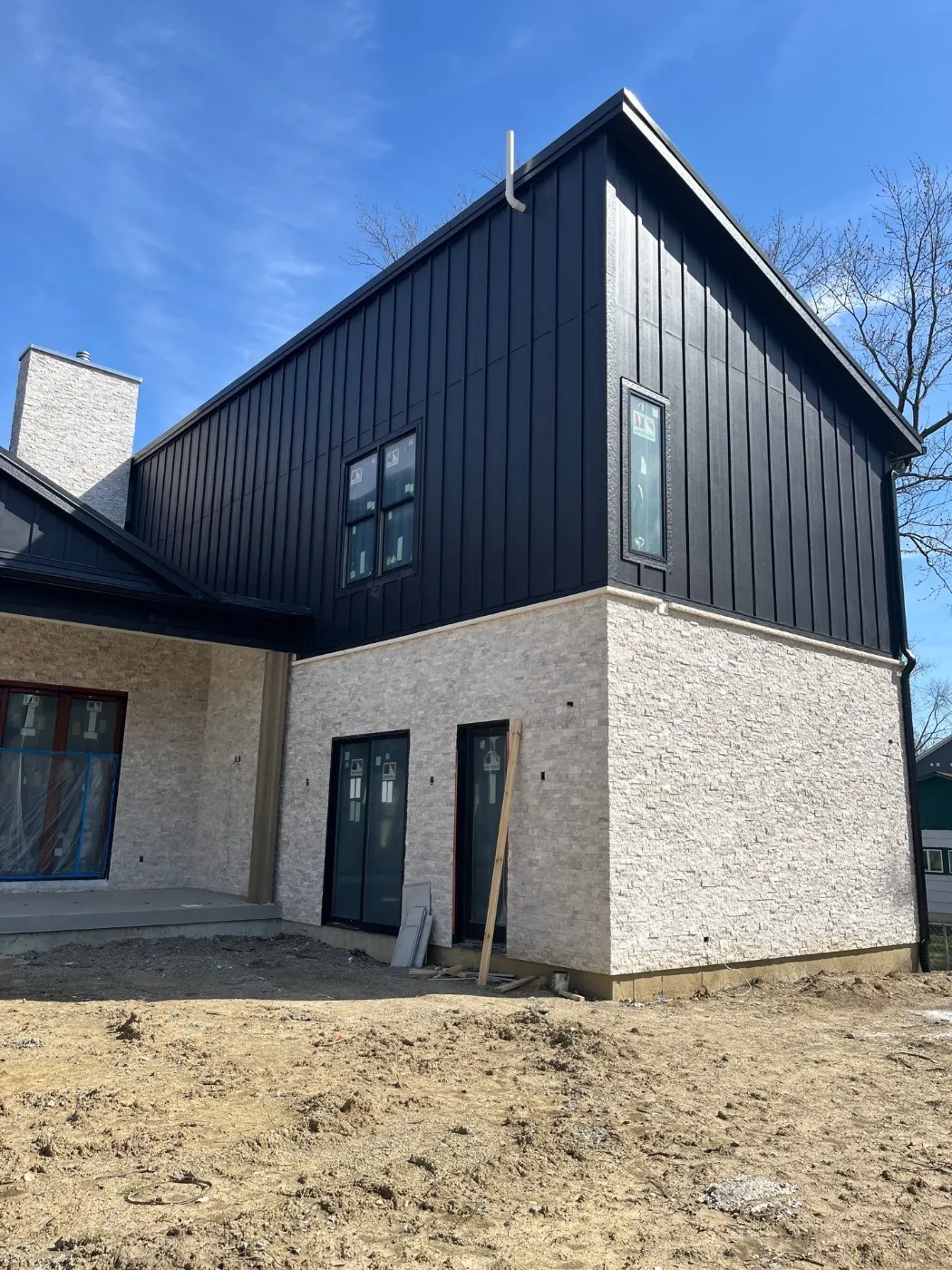 Siding installation documented in Cheswick Place